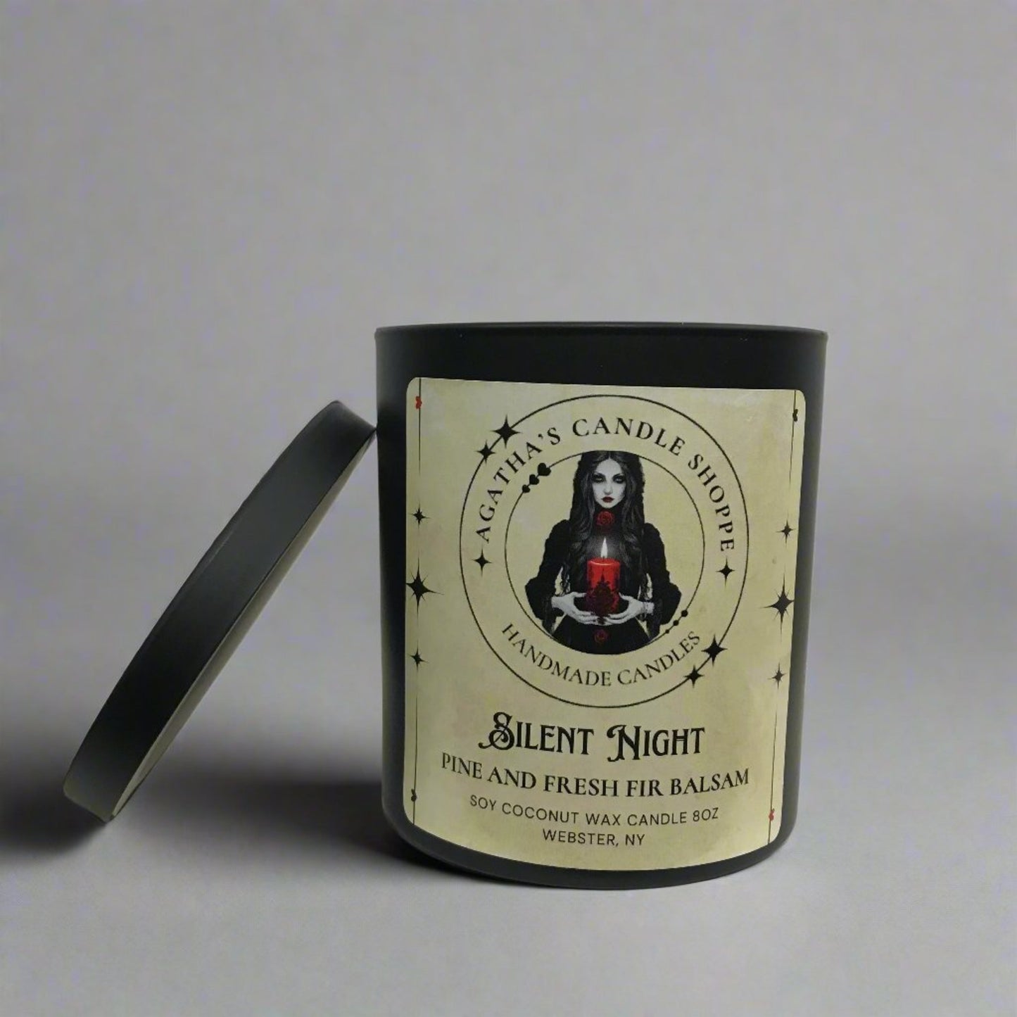 Dark gothic soy candle titled “Eternal Longing,” encased in black glass and, evoking forbidden desire, lost love, and haunting witchcraft atmosphere.